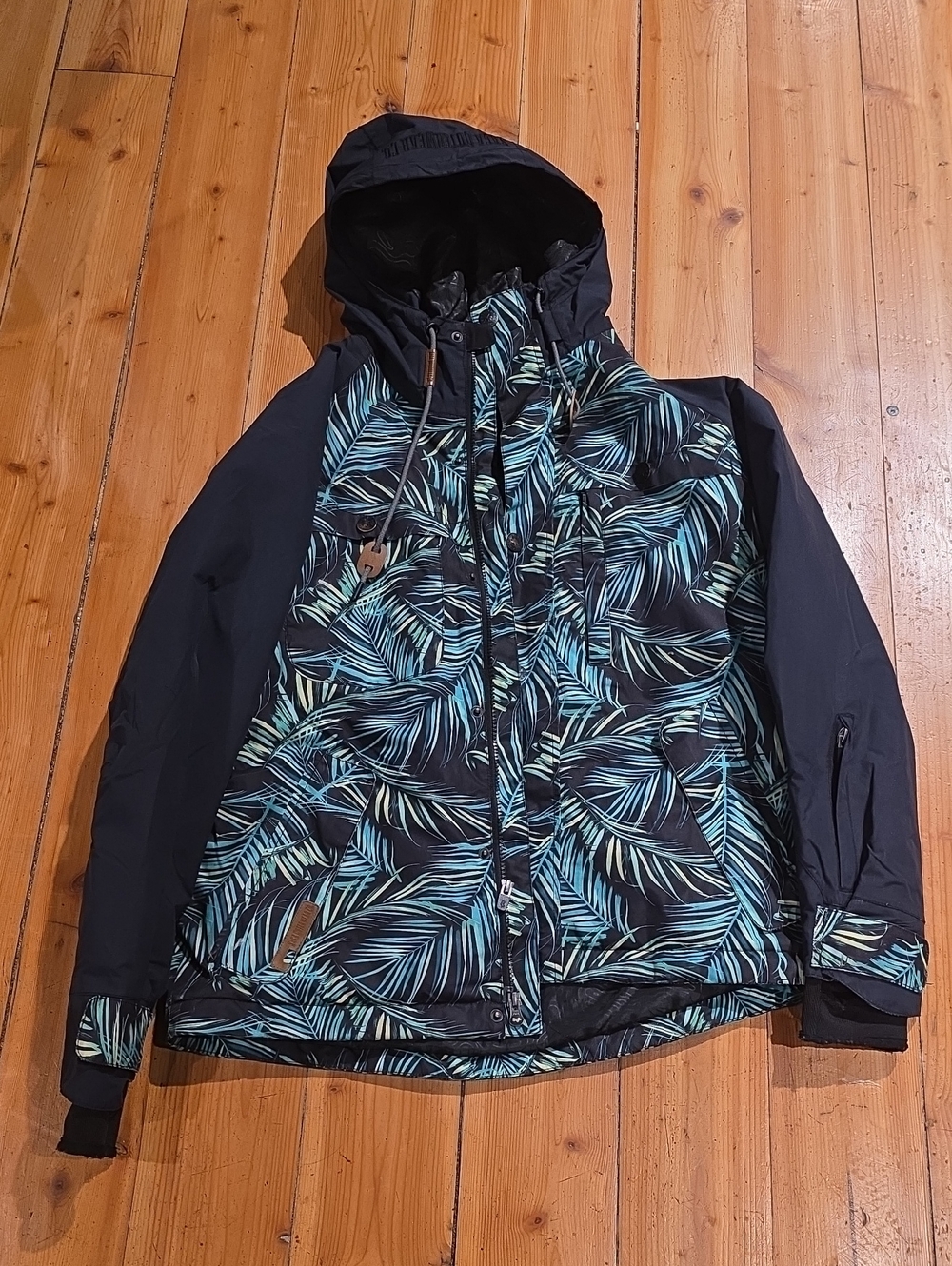 Men's Black Hooded Ski Jacket with Teal Leaf Print